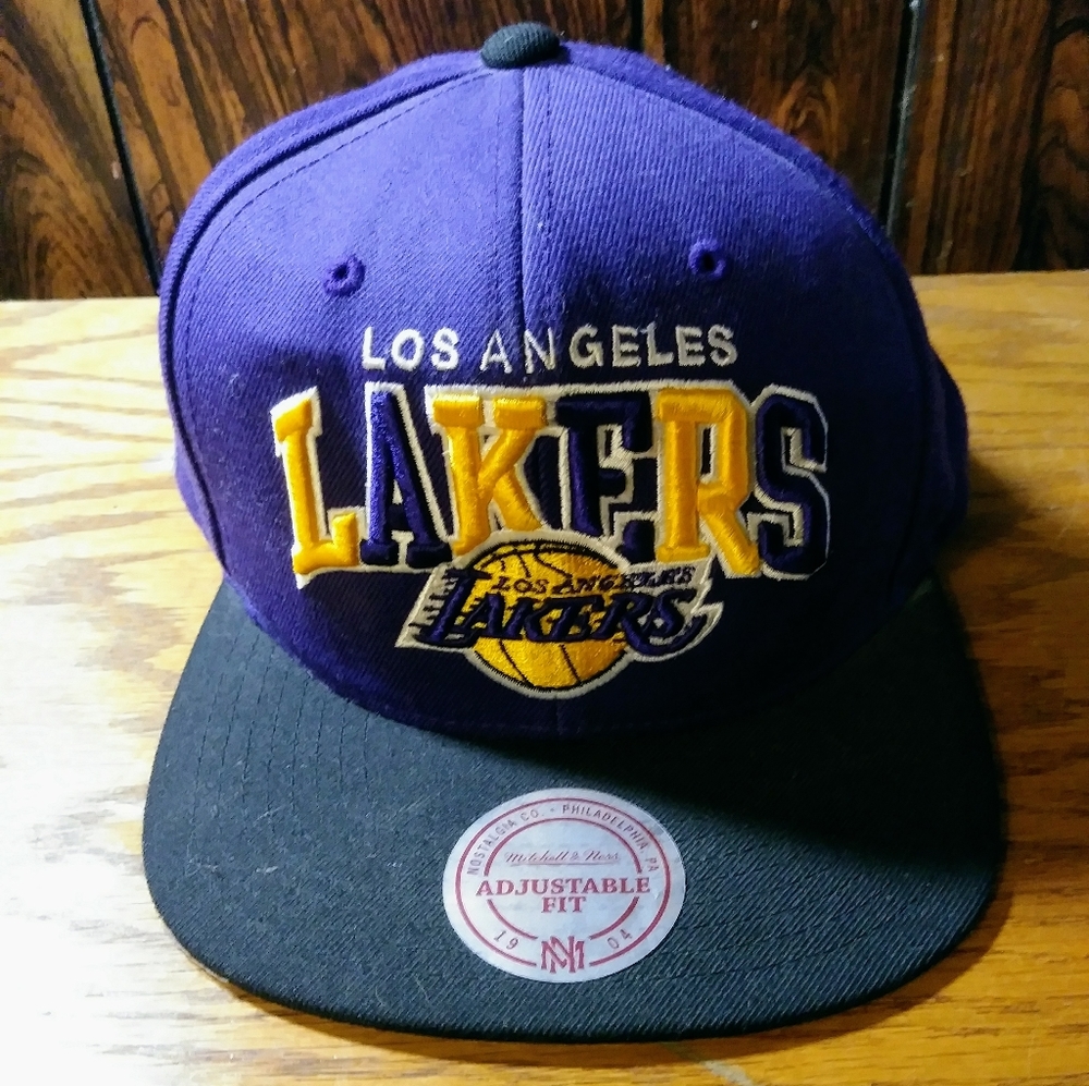 Mitchell & Ness L A Lakers Purple Black Embroidered Snapback Hat.